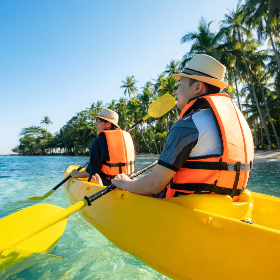 Man and woman canoeing