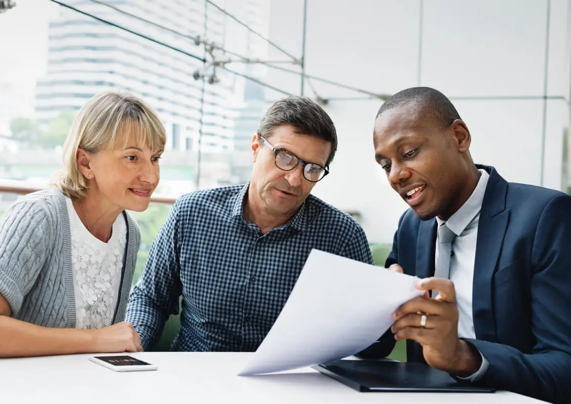 man helping couple with finances