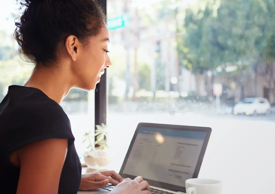 young woman using laptop