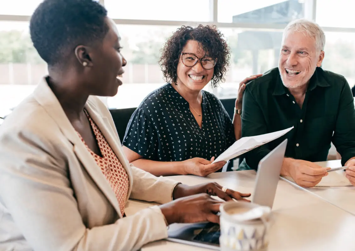 woman helping couple with finances