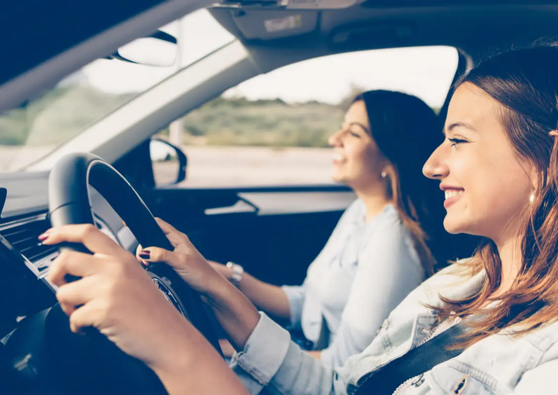 two young females in car