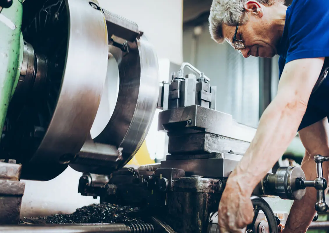 man working in machining setting