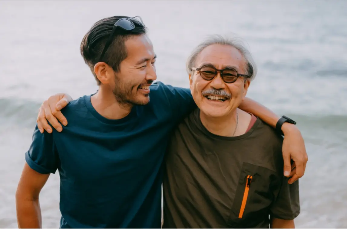 Father and son at beach